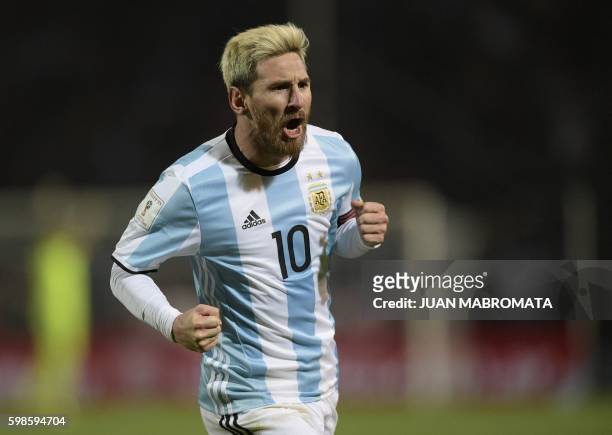 Argentina's Lionel Messi celebrates after scoring against Uruguay during the FIFA World Cup 2018 qualifier football match between Argentina and...