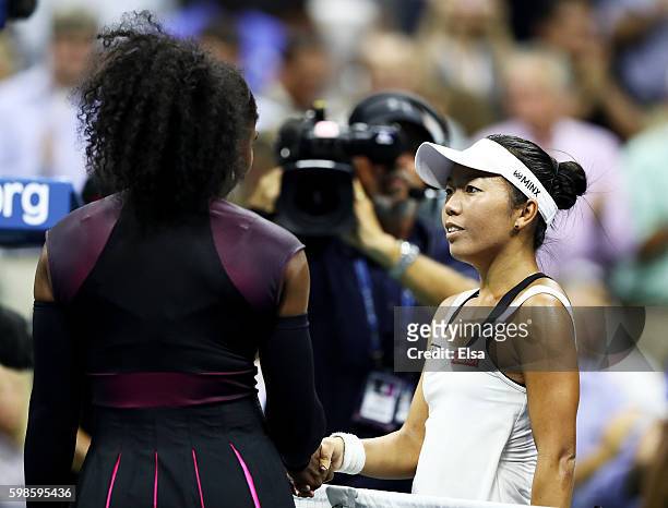 Serena Williams of the United States shakes hands with Vania King of the United States after their second round Women's Singles match on Day Four of...