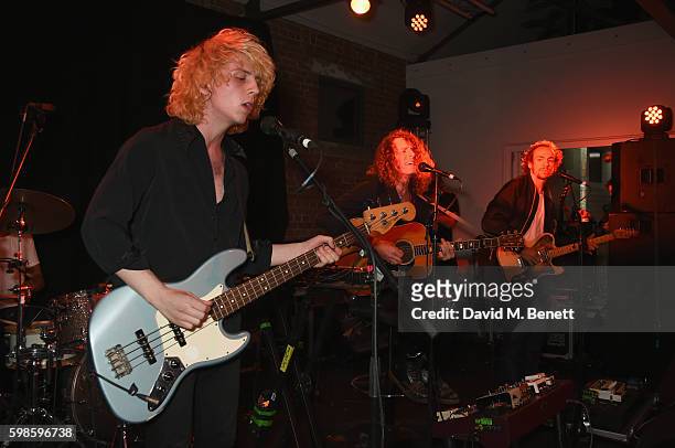 Jack Flanagan, Blaine Harrison and Williams Rees of The Mystery Jets perform at Krug Island, a food and music experience hosted by Krug champagne on...