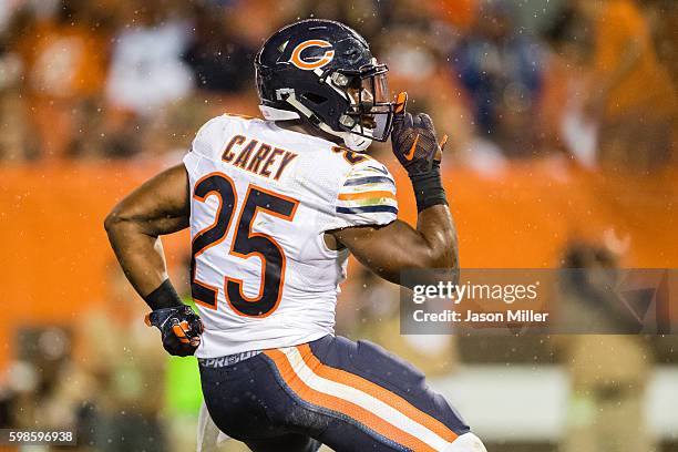 Running back Kevin Peterson of the Chicago Bears celebrates after scoring a touch down during the second quarter against the Cleveland Browns during...