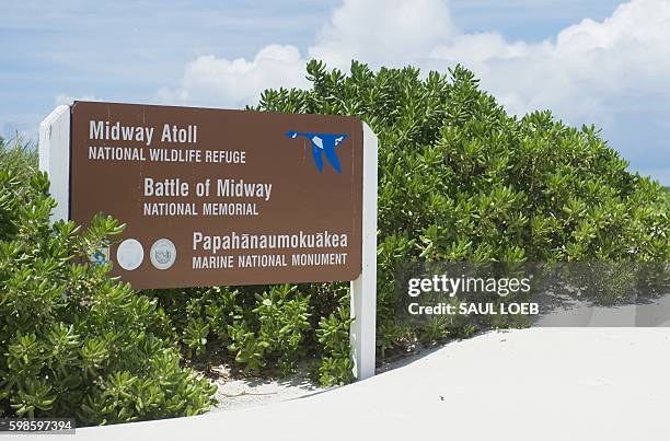 Sign for the Midway Atoll in the Papahanaumokuakea Marine National Monument in the Pacific Ocean, September 1 as US President Barack Obama tours the...