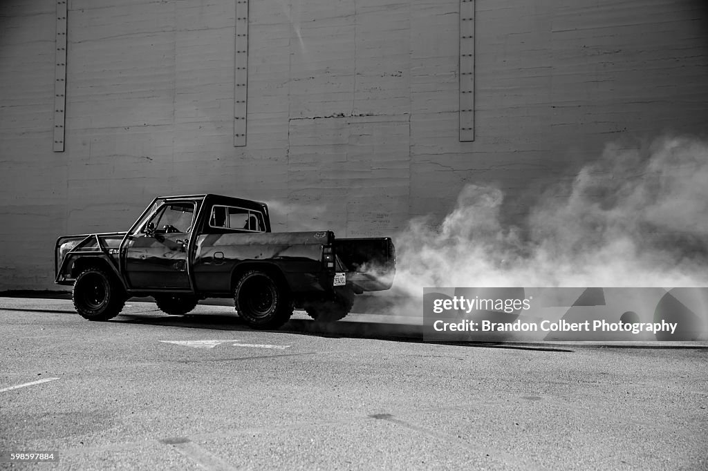 Male model with tattoos and his truck