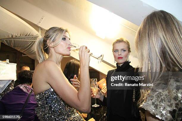 Models Teresa Maxova and Eva Herzigova are seen during a charity fashion show for kids on November 28, 2012 in Prague, Czech Republic.