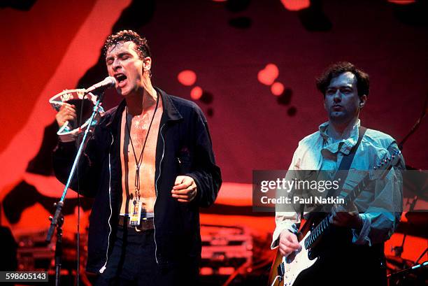 British alternative rock group Gang Of Four perform onstage at the Poplar Creek Music Theater, Hoffman Estates, Illinois, July 12, 1991. Pictured are...