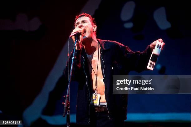 British alternative rock group Gang Of Four perform onstage at the Poplar Creek Music Theater, Hoffman Estates, Illinois, July 12, 1991. Pictured is...