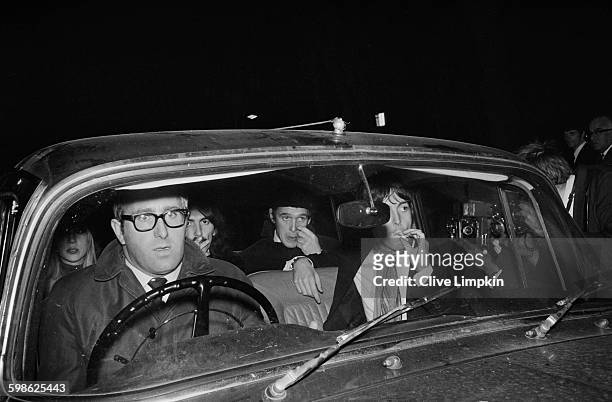 The Beatles on their way to a memorial service for their manager Brian Epstein, UK, 17th October 1967. From left to right, Patti Boyd, Mal Evans,...