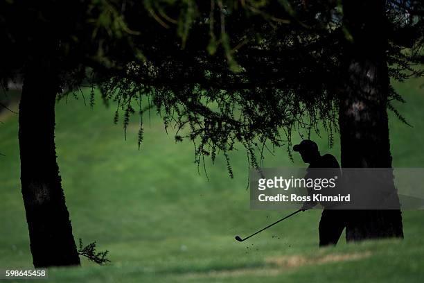 Paul Dunne of Ireland plays his second shot on the 12th hole during the second round of the Omega European Masters at Crans-sur-Sierre Golf Club on...