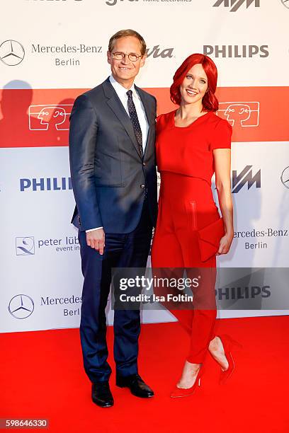Michael Mueller, mayor of Berlin and Miss IFA attend the IFA 2016 opening gala on September 1, 2016 in Berlin, Germany.