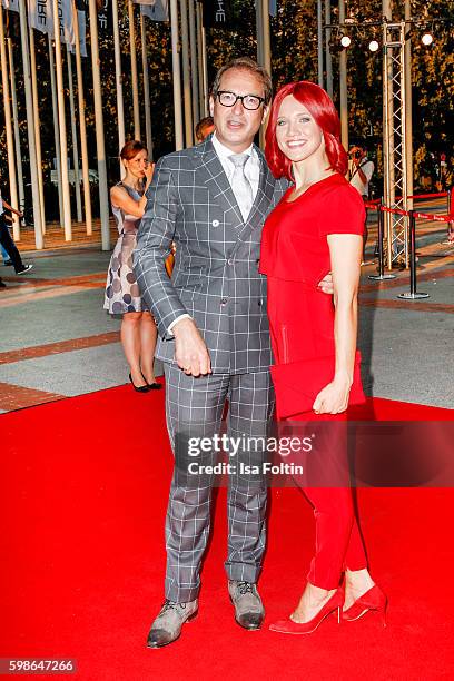 German minister of transport Alexander Dobrindt and Miss IFA attend the IFA 2016 opening gala on September 1, 2016 in Berlin, Germany.