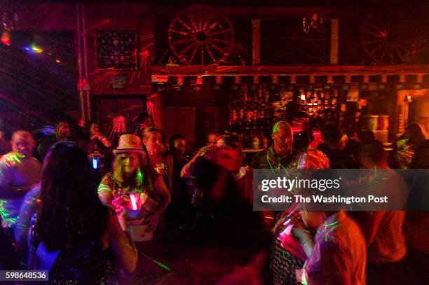 Patrons gather for drinks and dancing at the Globe Tavern on Saturday, February 6 in Stanley, Falkland Islands.