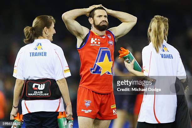Jason Akermanis of the All Stars captures his breath during the EJ Whitten Legends match at Etihad Stadium on September 2, 2016 in Melbourne,...