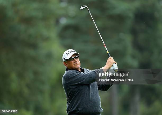 Peter O'Malley of Australia plays his second shot into the second hole during the first round of the Travis Perkins Masters at Woburn Golf Club on...