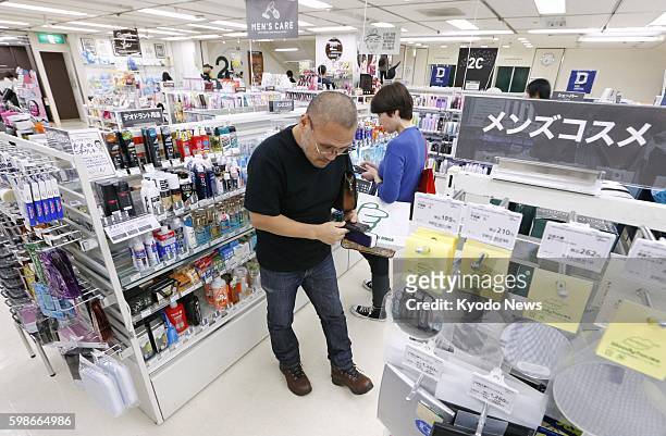Japan - Photo taken June 11 shows the sales area for male beauty products at retailer Tokyu Hands' store in Tokyo's Shibuya district. Young Japanese...