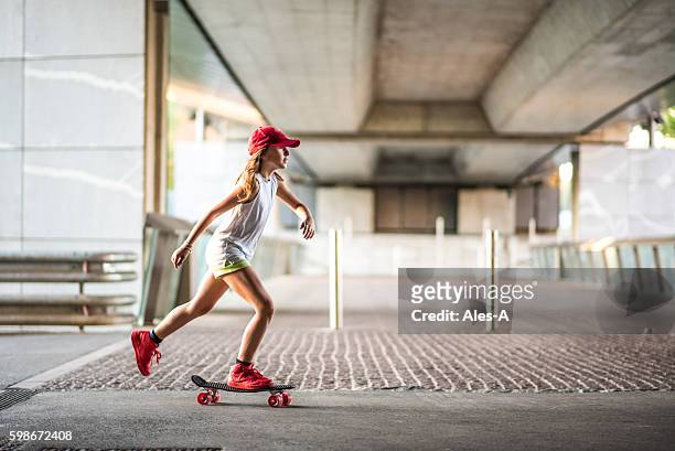 cute skateboard girl - baby girls stock pictures, royalty-free photos & images