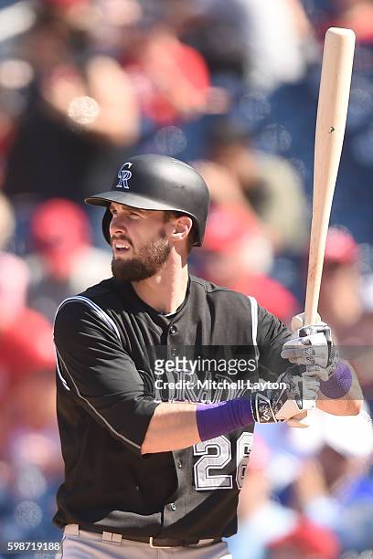 David Dahl of the Colorado Rockies prepares for a pitch during a baseball game against the Washington Nationals at Nationals Park on August 27, 2016...