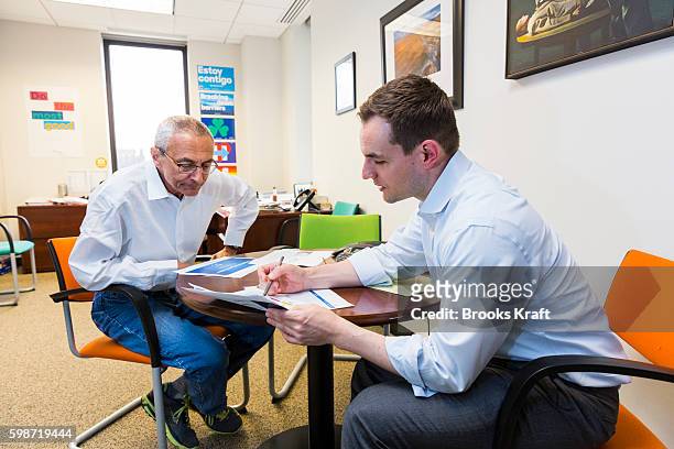 John Podesta, Campaign Chairman , and Robby Mook, Campaign Manager for Democratic presidential candidate Hillary Clinton, meet inside the campaign...