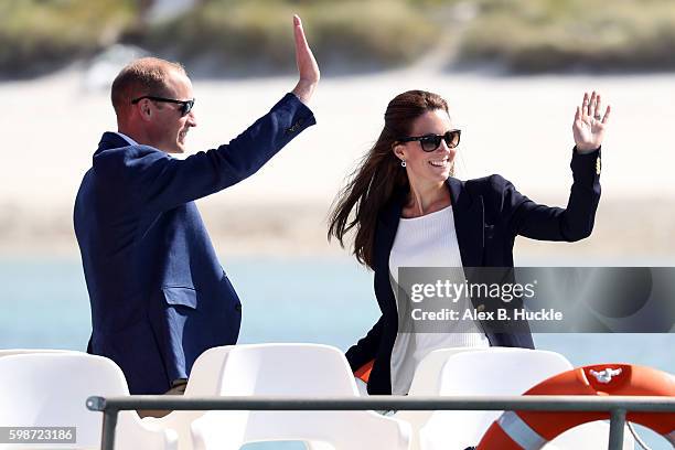Prince William, Duke of Cambridge and Catherine, Duchess of Cambridge leave Tresco on 'Pegasus' during a visit to Cornwall on September 2, 2016 in...