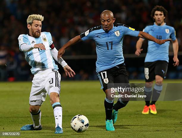 Lionel Messi, of Argentina, and Egidio Arevalo Rios of Uruguay vie for the ball during a match between Argentina and Uruguay as part of FIFA 2018...