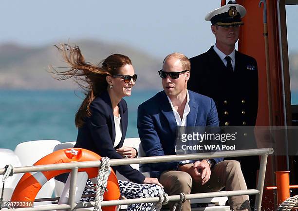 Prince William, Duke of Cambridge and Catherine, Duchess of Cambridge travel by boat to St Martins, after visiting Tresco Abbey Garden on September...