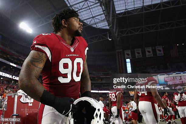 Defensive tackle Robert Nkemdiche of the Arizona Cardinals on the bench during the preseaon NFL game against the Denver Broncos at the University of...