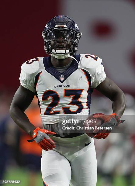 Running back Ronnie Hillman of the Denver Broncos warms up before the preseaon NFL game against the Arizona Cardinals at the University of Phoenix...