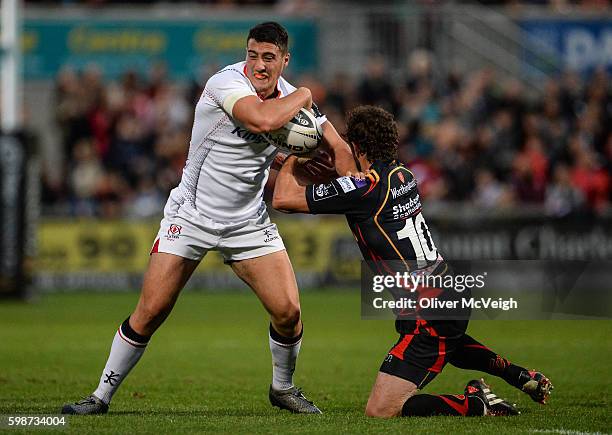 Northern Ireland , Ireland - 2 September 2016; Brett Herron of Ulster is tackled by Nick Macleodof Newport Gwent Dragons during the Guinness PRO12...