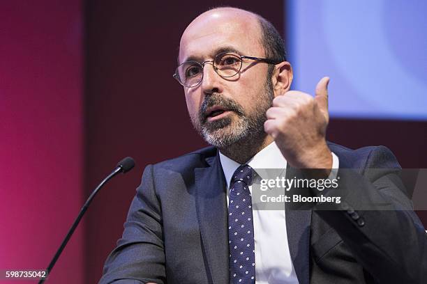 Umit Leblebici, chief executive officer of Turk Ekonomi Bankasi AS , gestures as he speaks on a panel during the BloombergHT investor conference in...