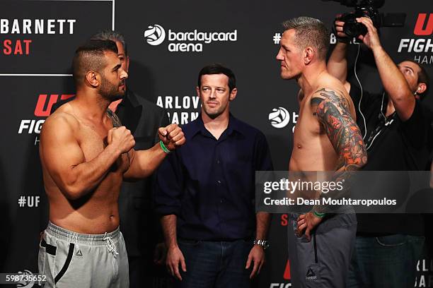 Christian Colombo of Denmark and Jarjis Danho of Syria come face to face during the UFC Fight Night Weigh-in held at Barclaycard Arena on September...
