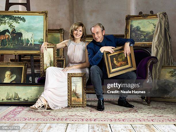 Fine art specialist Phillip Mould and tv presenter Fiona Bruce are photographed for the Daily Mail on July 5, 2016 in London, England.