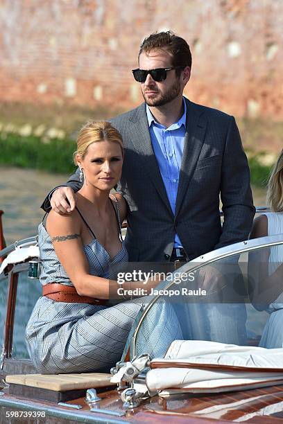 Michelle Hunziker and Tomaso Trussardi are seen during the 73rd Venice Film Festival on September 2, 2016 in Venice, Italy.