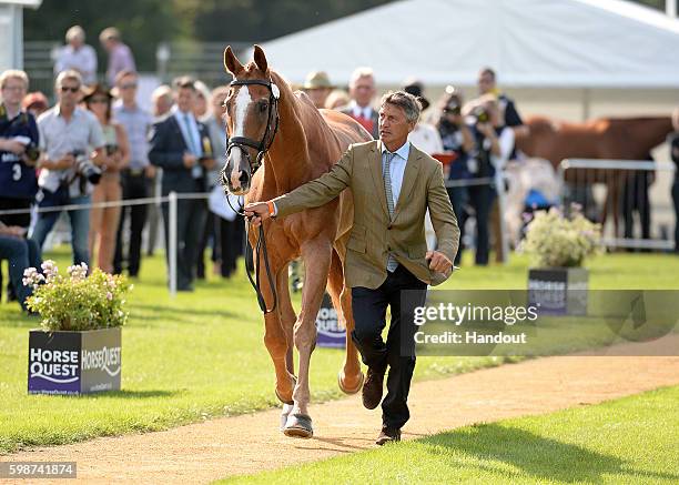 Andrew Nicholson of New Zealand and Nereo during a horse inspection in August 2015at The Land Rover Burghley Horse Trials 2016 on September 3, 2015...