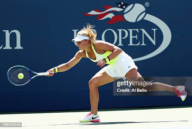 Carina Witthoeft of Germany returns a shot to Roberta Vinci of Italy during her third round Women's Singles match on Day Five of the 2016 US Open at...