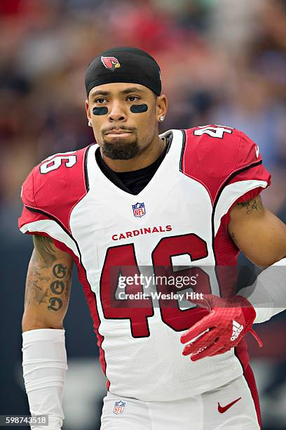 Asa Jackson of the Arizona Cardinals warms up before a preseason game against the Houston Texans at NRG Stadium on August 28, 2016 in Houston, Texas....