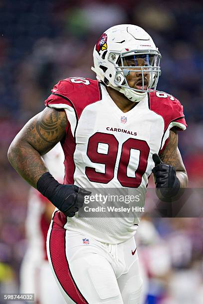 Robert Nkemdiche of the Arizona Cardinals jogs off the field during a preseason game against the Houston Texans at NRG Stadium on August 28, 2016 in...