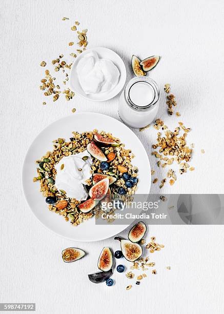 breakfast bowl with figs and blueberries - healthy eating white background stock pictures, royalty-free photos & images
