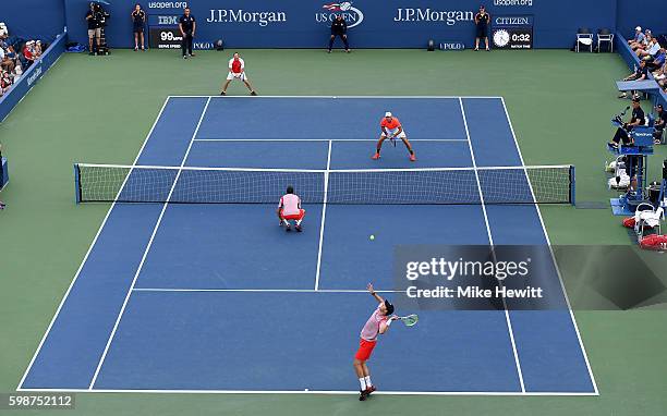 Bob Bryan and Mike Bryan of the United StatMike Bryan of the United States in action against Jonathan Erlich of Israel and Santiago Gonzalez of...