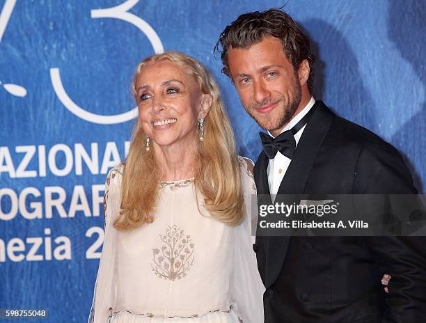 Franca Sozzani and Francesco Carrozzini attend the premiere of 'Franca: Chaos And Creation' during the 73rd Venice Film Festival at Sala Giardino on...