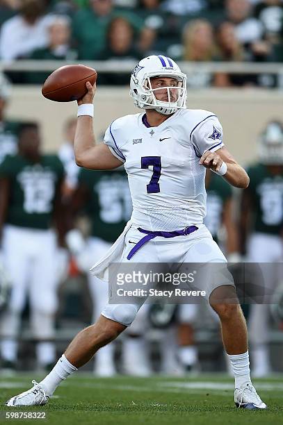 Blazejowski of the Furman Paladins drops back to pass during a game against the Michigan State Spartans at Spartan Stadium on September 2, 2016 in...