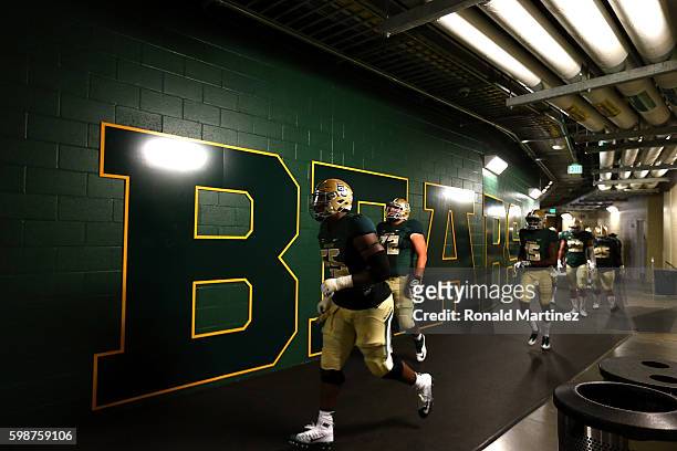 The Baylor Bears run to the field before a game against the Northwestern State Demons at McLane Stadium on September 2, 2016 in Waco, Texas.