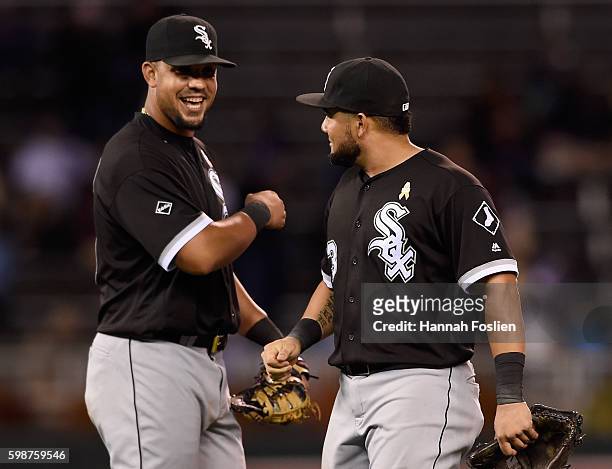 Jose Abreu and Melky Cabrera of the Chicago White Sox celebrate winning the game against the Minnesota Twins on September 2, 2016 at Target Field in...