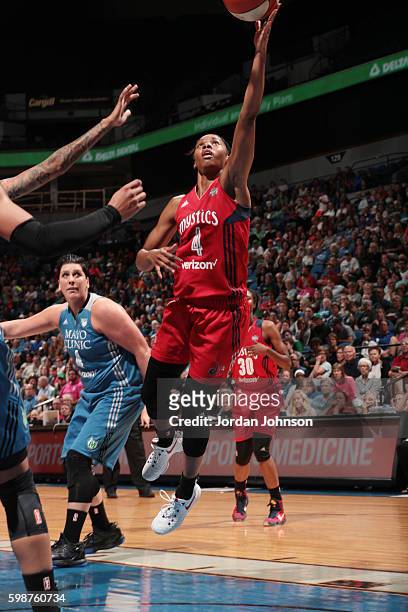 Tayler Hill of the Washington Mystics shoots the ball against Janel McCarville of the Minnesota Lynx on September 2, 2016 at Target Center in...