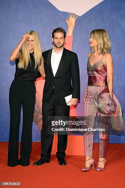 Michelle Hunziker, Tomaso Trussardi and Gaia Trussardi attend the premiere of 'Franca: Chaos And Creation' during the 73rd Venice Film Festival at...