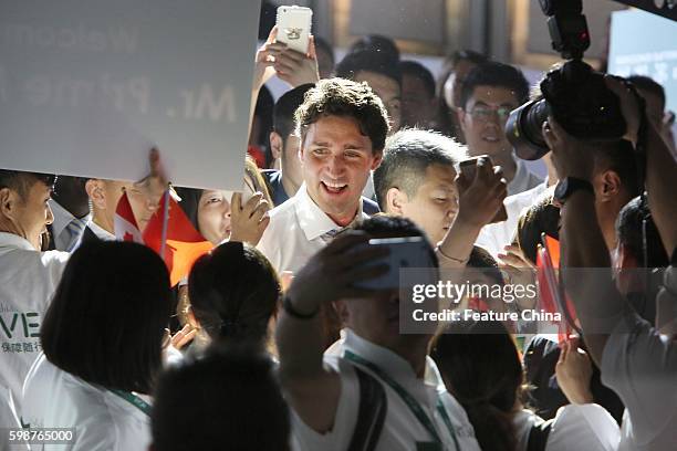 Canadian Prime Minister Justin Trudeau, center, attends the launch ceremony of Move program of Manulife, on September 02, 2016 in Shanghai, China....