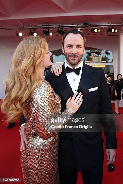 Amy Adams and Tom Ford attend the premiere of 'Nocturnal Animals' during the 73rd Venice Film Festival at Sala Grande on September 2, 2016 in Venice,...