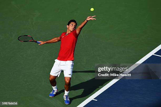 Nicolas Almagro of Spain serves to Gael Monfils of France during his third round Men's Singles match on Day Five of the 2016 US Open at the USTA...
