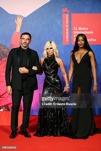 Riccardo Tisci, Donatella Versace, Naomi Campbell attend the premiere of 'Franca: Chaos And Creation' during the 73rd Venice Film Festival at Sala...