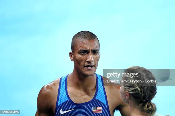 Day 13 Ashton Eaton of the United States is congratulated by his wife Brianne Theisen-Eaton after winning the gold medal in the Men's Decathlon event...