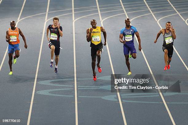 Day 13 A panoramic view of Usain Bolt of Jamaica winning the gold medal in the Men's 200m Final with Andre De Grasse of Canada winning the silver...