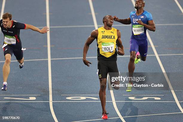 Day 13 Usain Bolt of Jamaica winning the gold medal in the Men's 200m Final with Christophe Lemaitre, , of France winning the bronze medal at the...