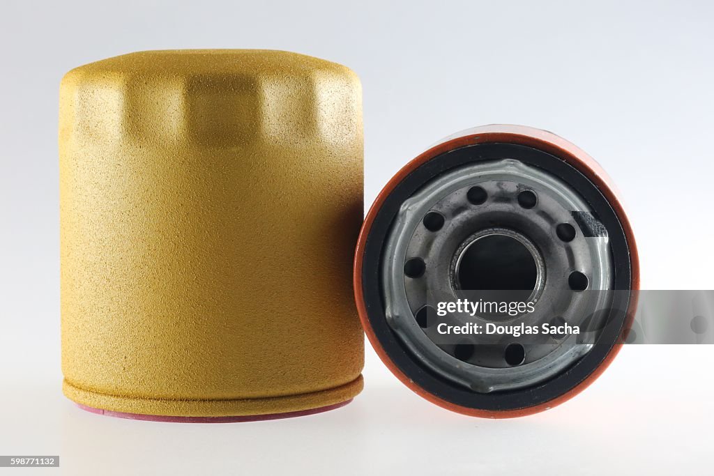 Canister oil filter used to remove contaminants from motor oil in an internal-combustion engines